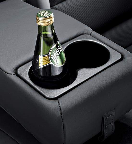 Rear center armrest with cup holders
