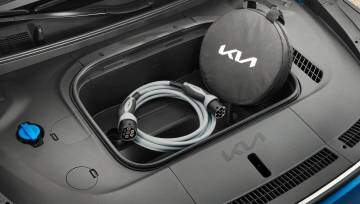 EV9 interior showing charging cable, mode 3