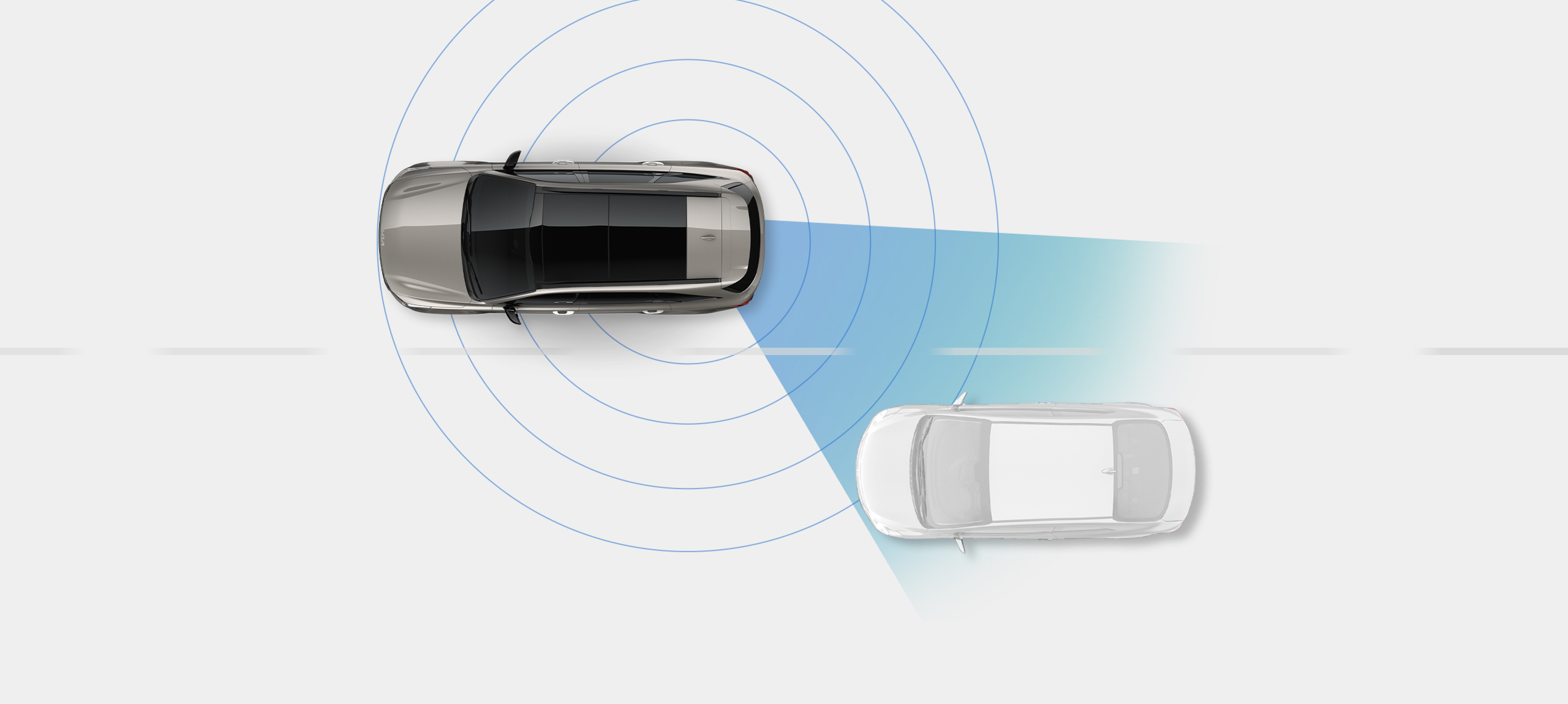 Vehículo Kia en una vista panorámica delante de un automóvil genérico en otro carril, con anillos a su alrededor para mostrar cómo el automóvil detecta los puntos ciegos
