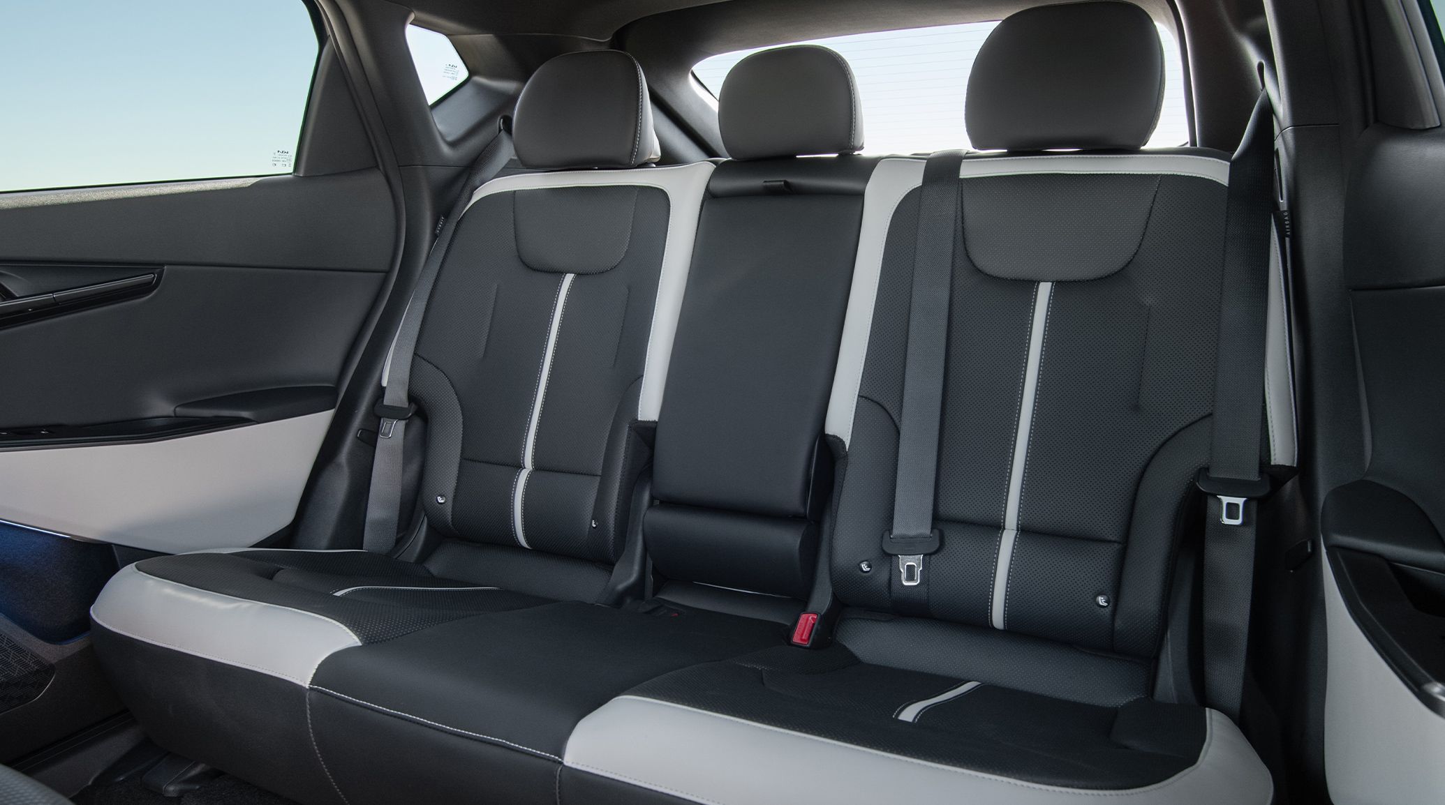 The three back seats of the 2026 Kia EV6 GT-Line AWD CUV, highlighting the ample rear passenger space and room for additional cargo and storage.
