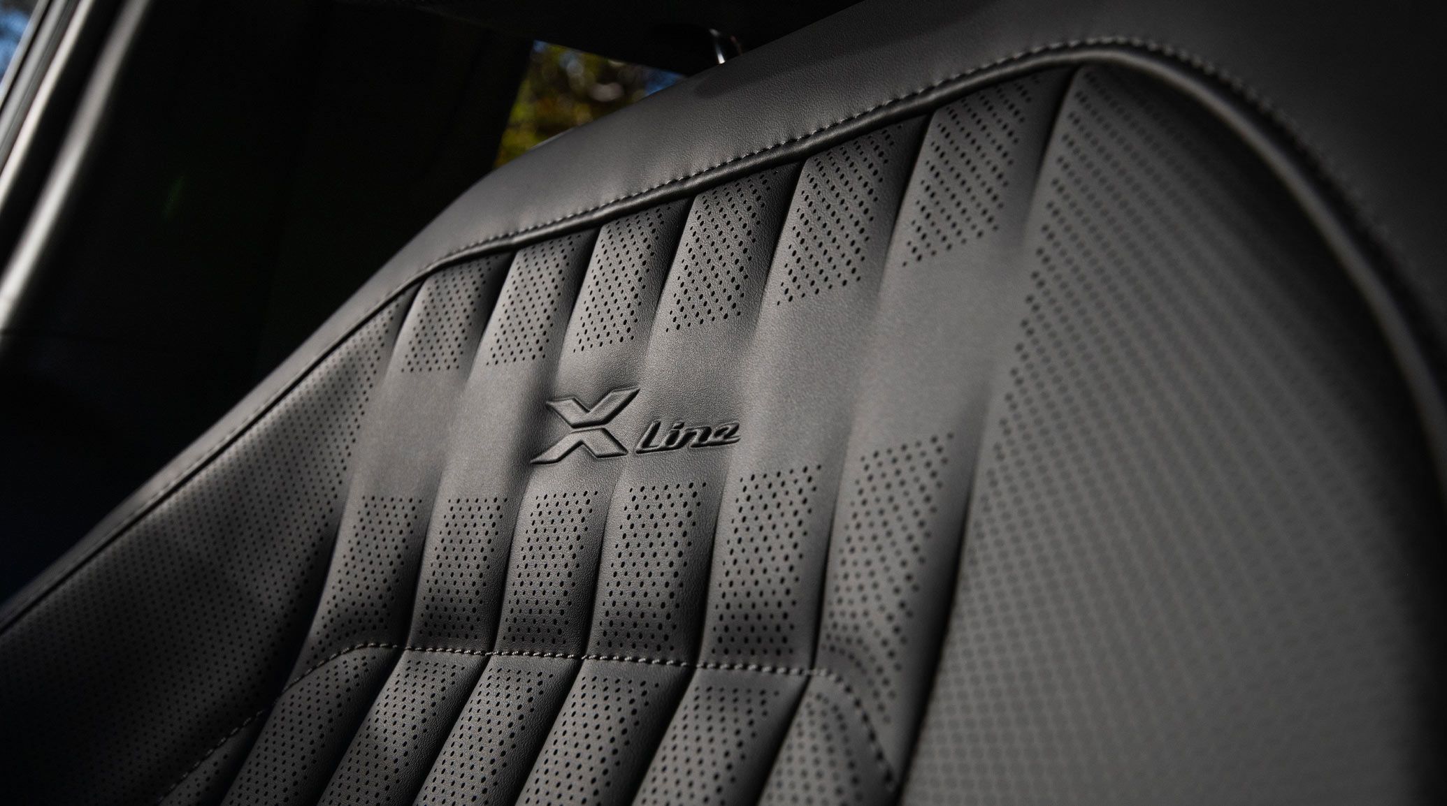 2027 Kia Seltos interior showing the driver's display and steering wheel controls