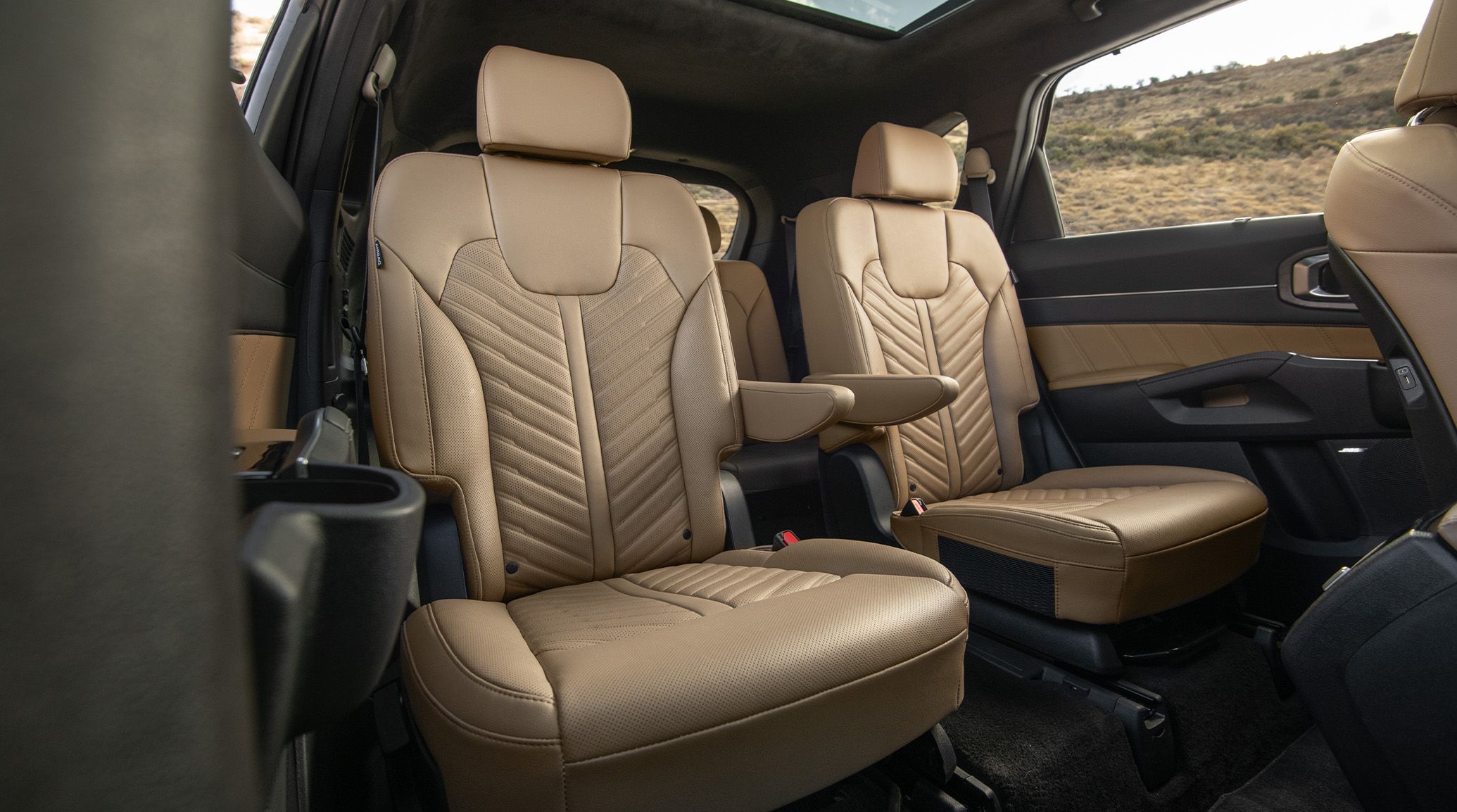 2026 Kia Sorento X-Pro SX Prestige AWD interior, three-quarter view of the second-row captain chairs