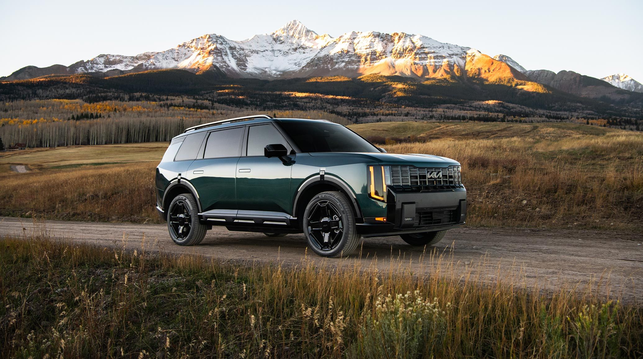 2027 kia telluride X-Line SX Prestige shown in Black Jade Green with gloss black side view mirrors. 