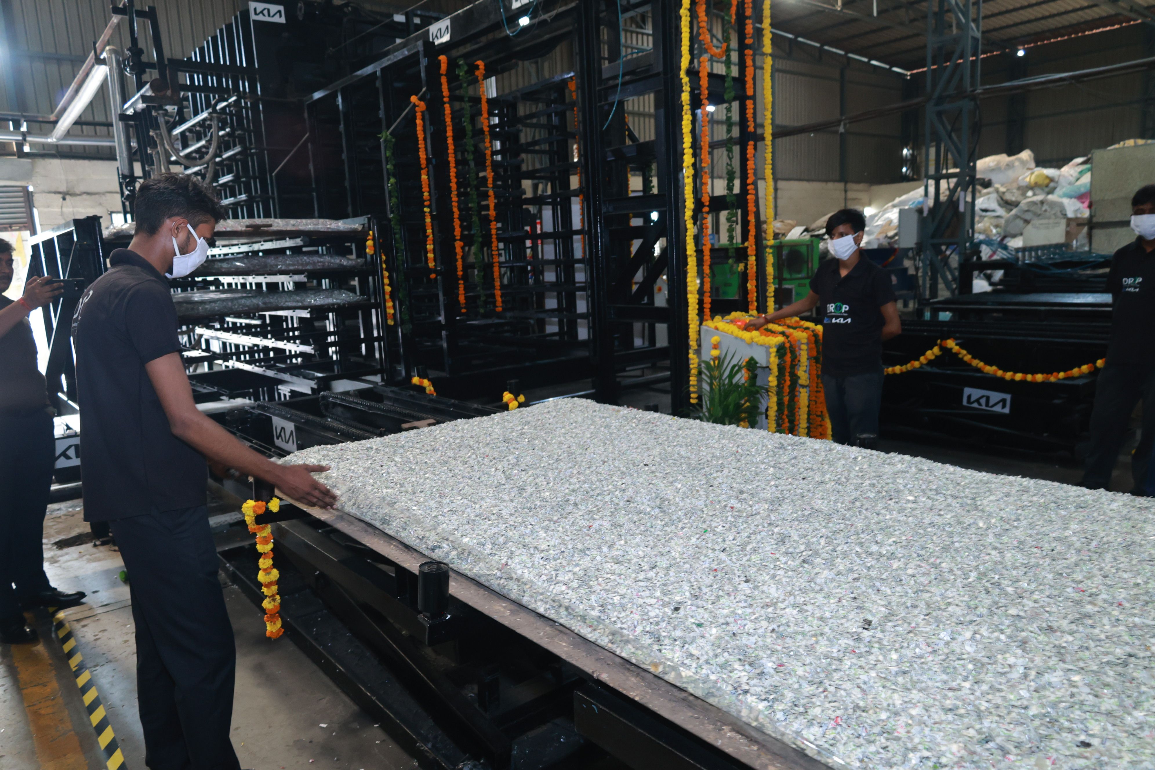 Front view of a white Kia Seltos SUV parked on a driveway