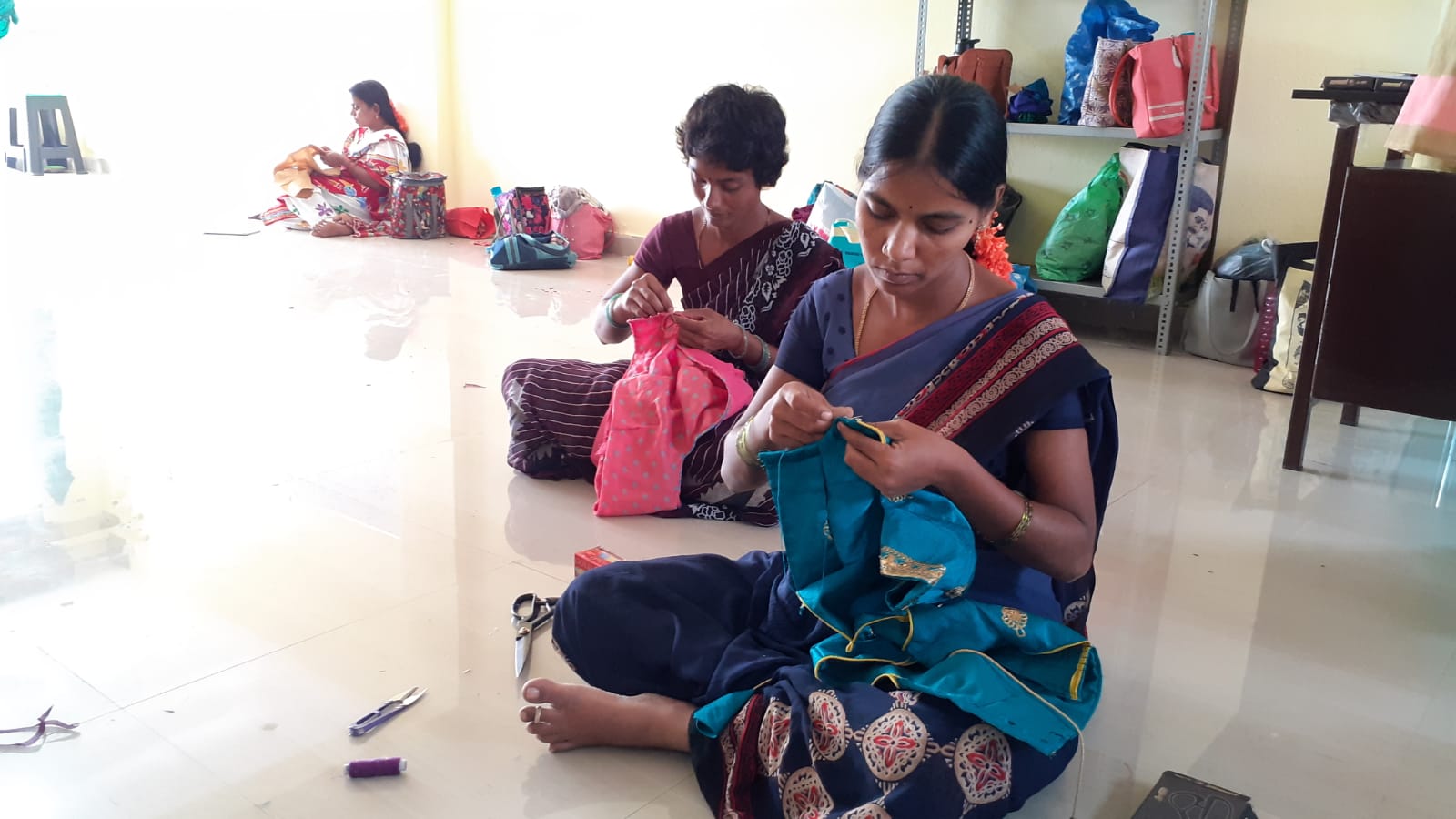 Exterior image view of Kia seltos compact suv in pewter olive color