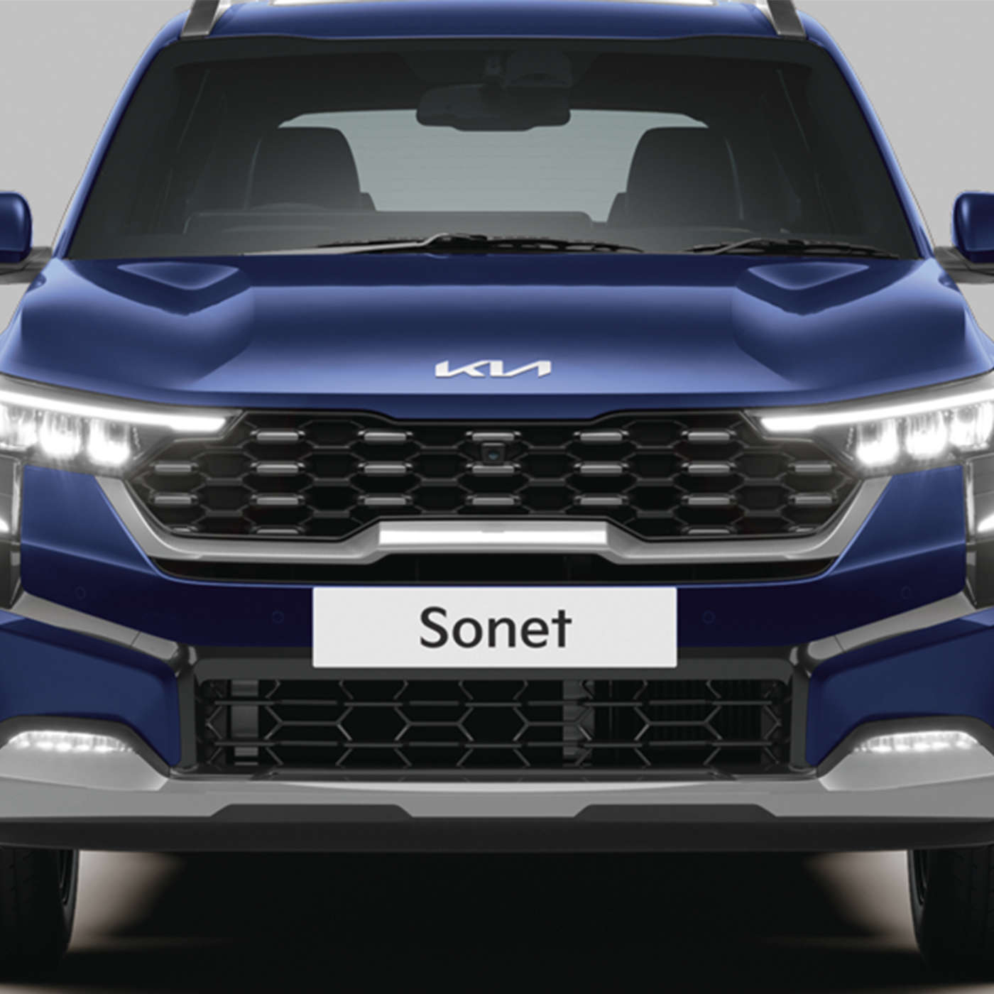 2023 Kia sonet Accelerating On A Narrow Road Front View