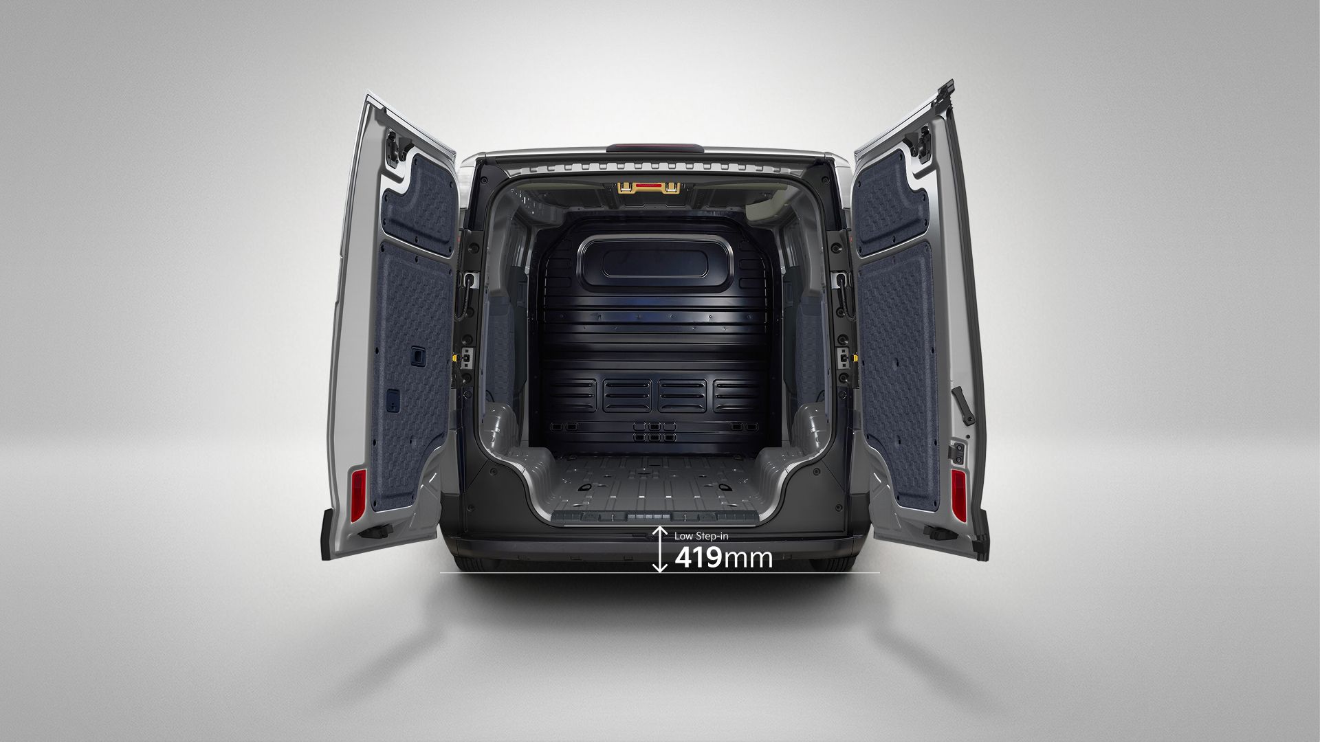 Rear view of the Kia PV5 Cargo with opened cargo doors