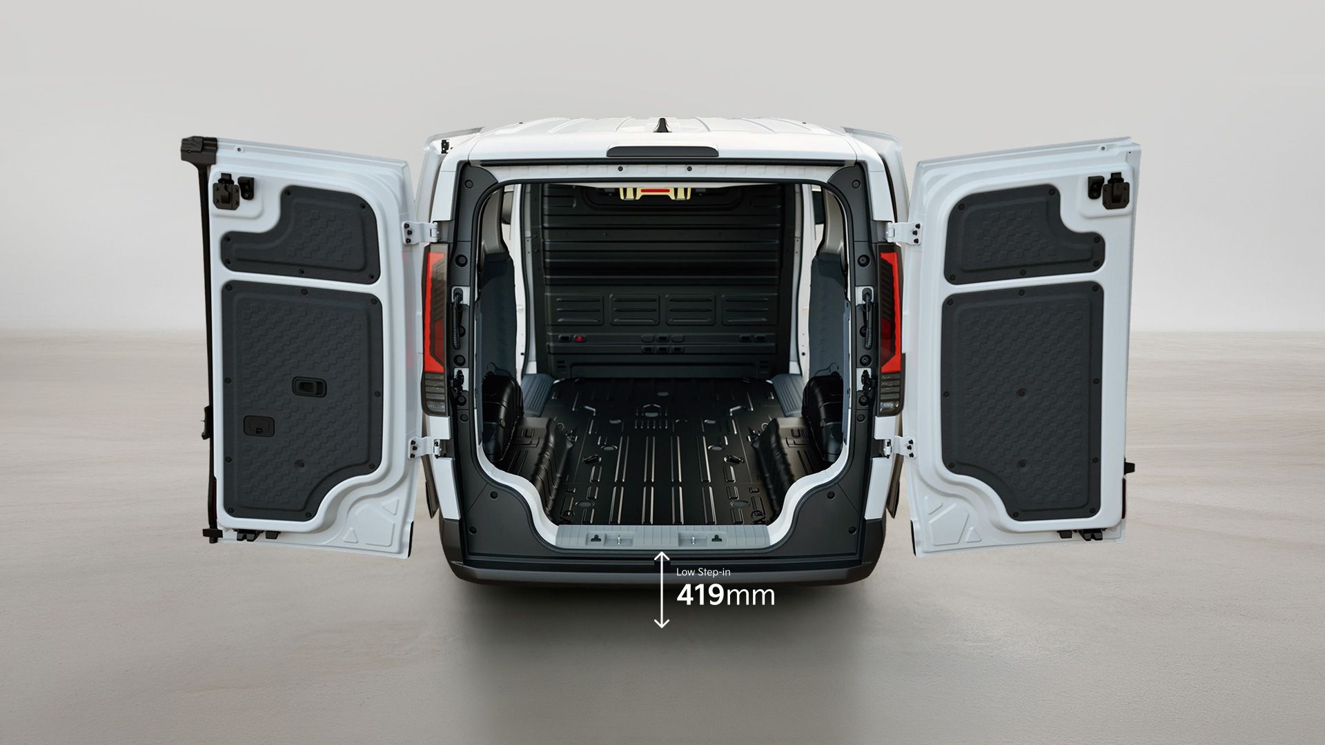 Rear view of the Kia PV5 Cargo with opened cargo doors