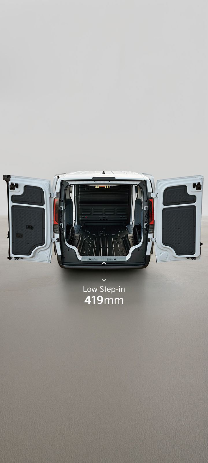 Rear view of the Kia PV5 Cargo with opened cargo doors