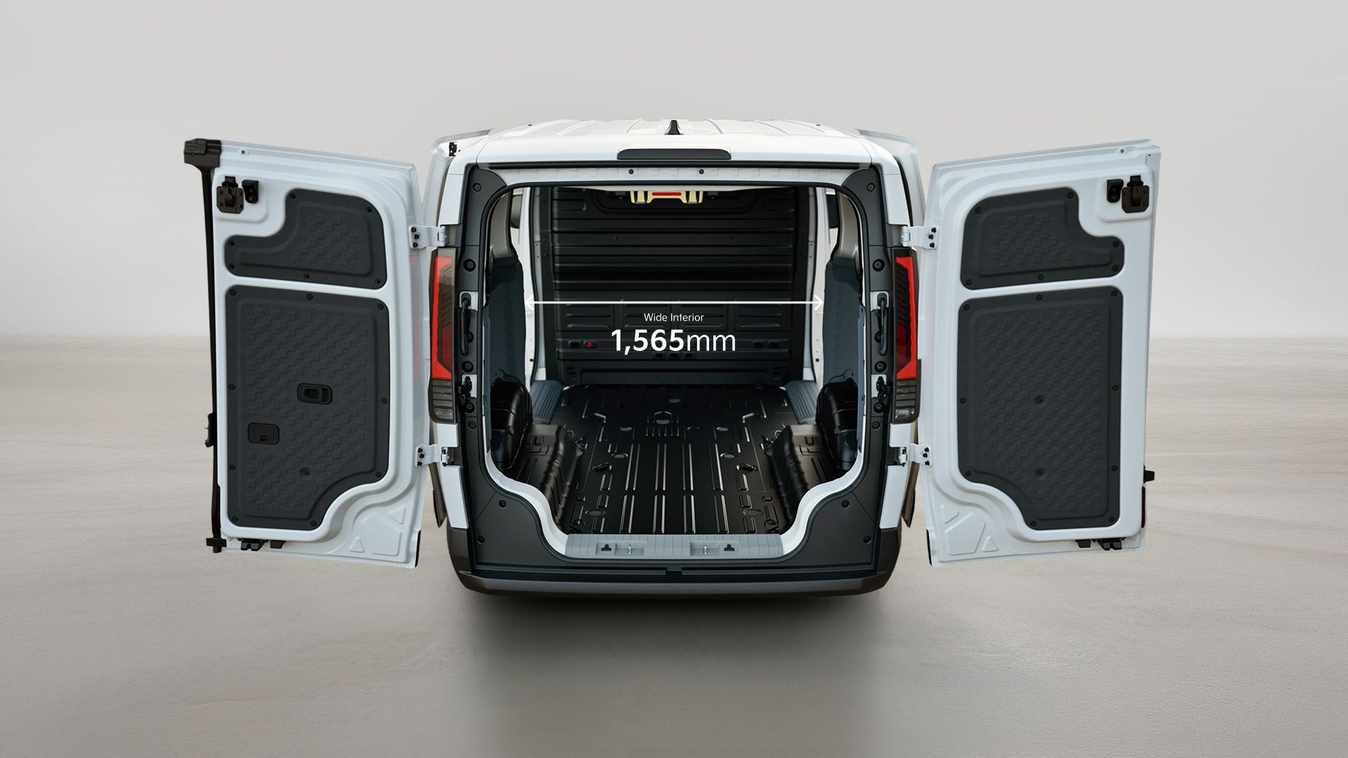 Rear view of the Kia PV5 Cargo with opened cargo doors
