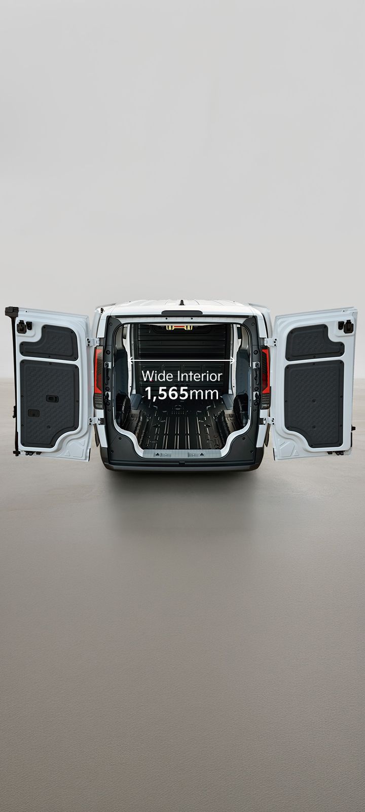 Rear view of the Kia PV5 Cargo with opened cargo doors