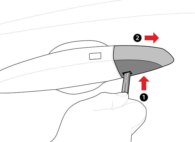 Illustration explaining how to remove the keyhole cover on the driver's door handle