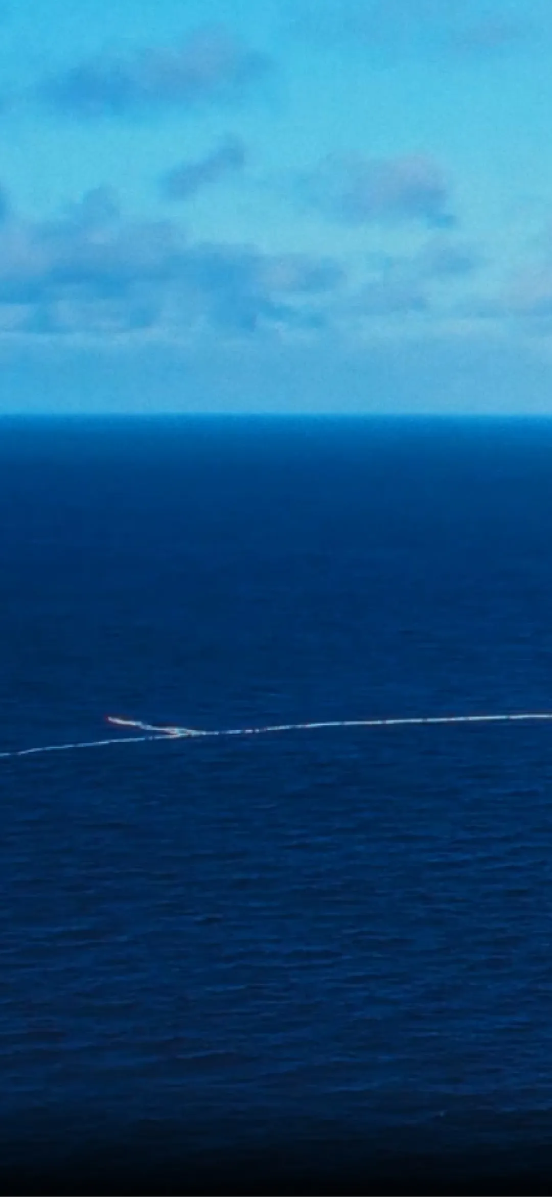 Ocean Cleanup vessel by Kia collecting marine waste at sea