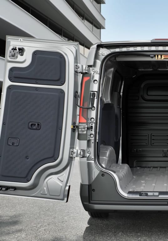 Wide-open rear doors of the Kia PV5 Cargo