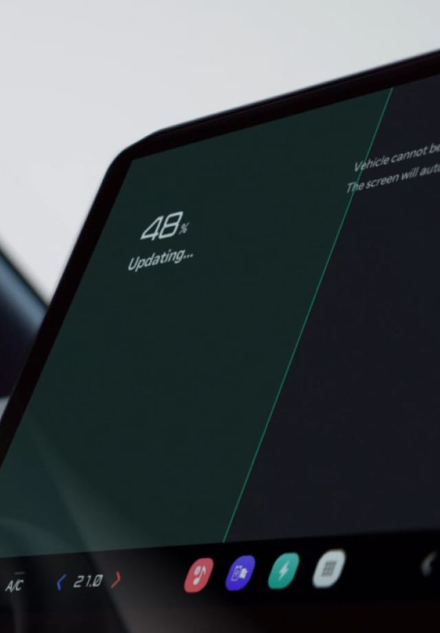 Infotainment screen showing over-the-air update in progress