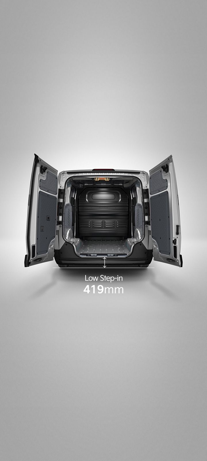 Rear view of the Kia PV5 Cargo with opened cargo doors