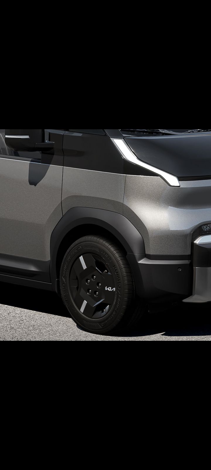 Close-up of the Kia PV5 Cargo right rear wheel and fender