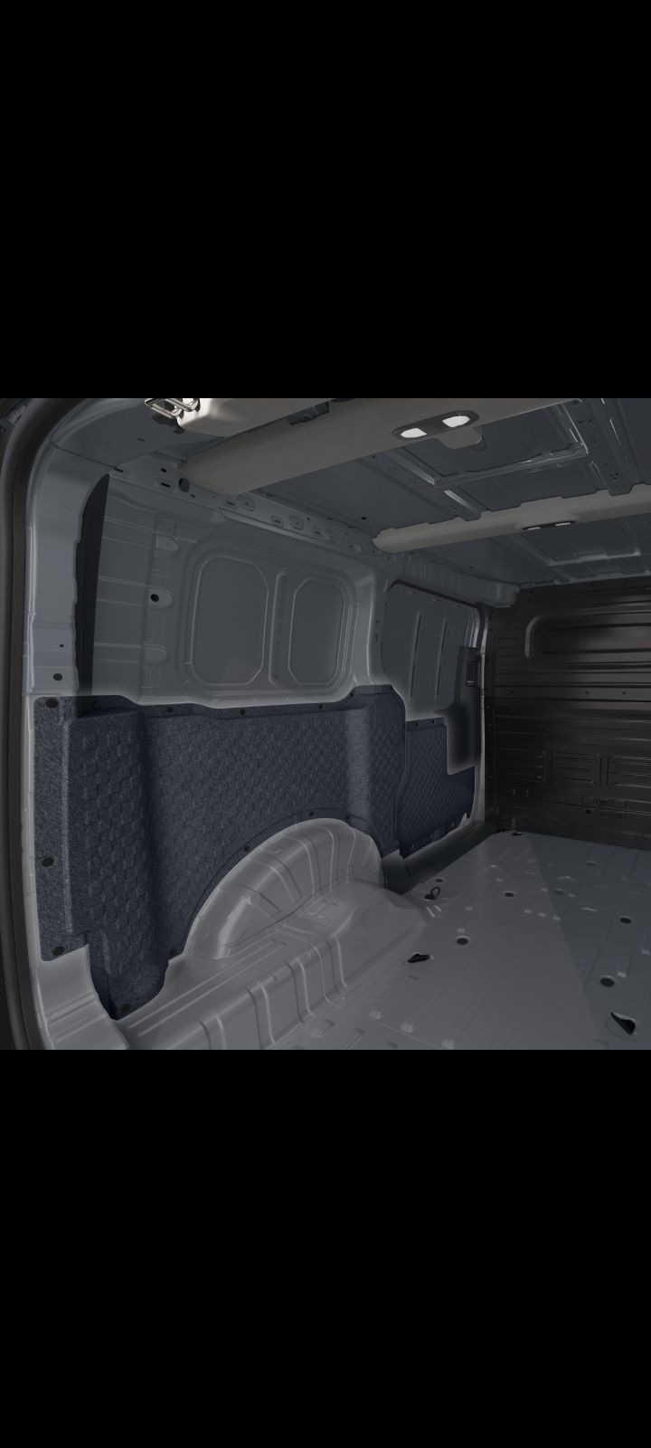 Close-up of the Kia PV5 Cargo interior side wall panel