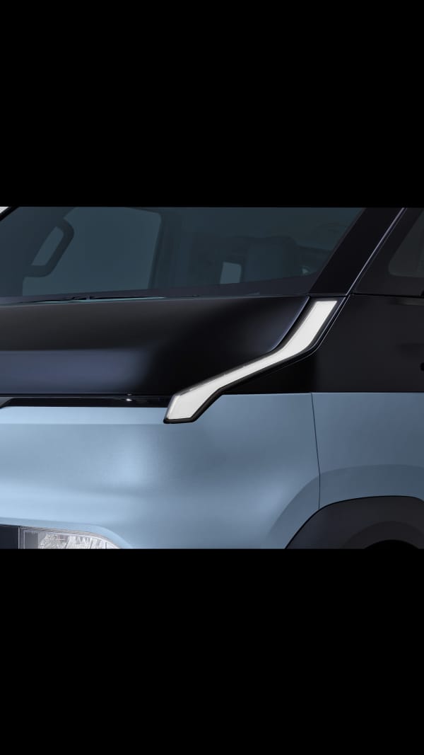 Close-up of the Kia PV5 Passenger LED daytime running lights