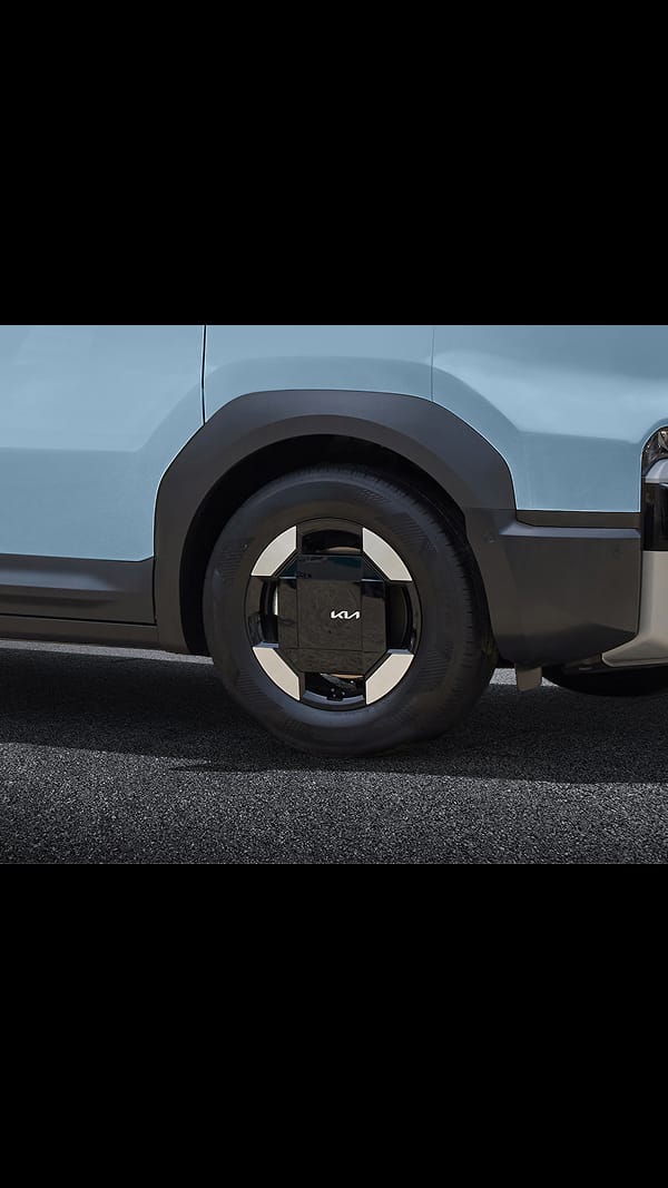 Side view of the Kia PV5 Passenger wheel arch with durable cladding design
