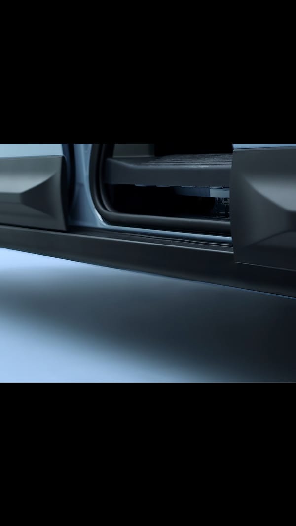 Close-up of the Kia PV5 Passenger low 399 mm step-in height with sliding door