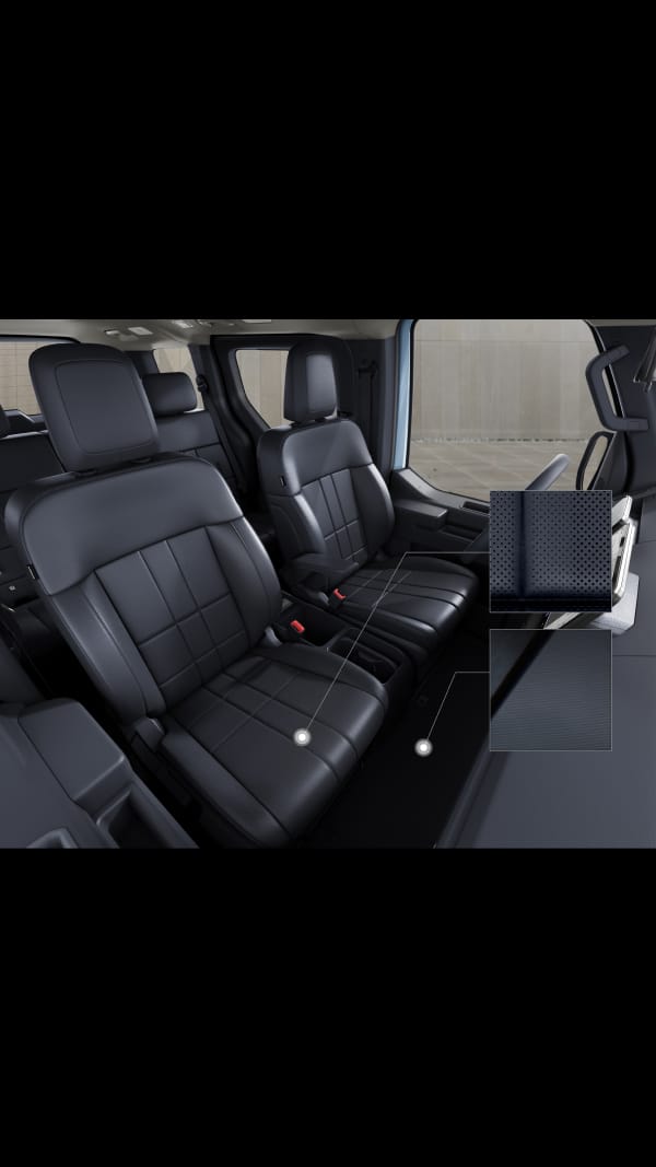 Interior view of the Kia PV5 Passenger featuring durable, wear-resistant seats and easy-clean TPO flooring designed for family trips, children, cargo, and everyday use