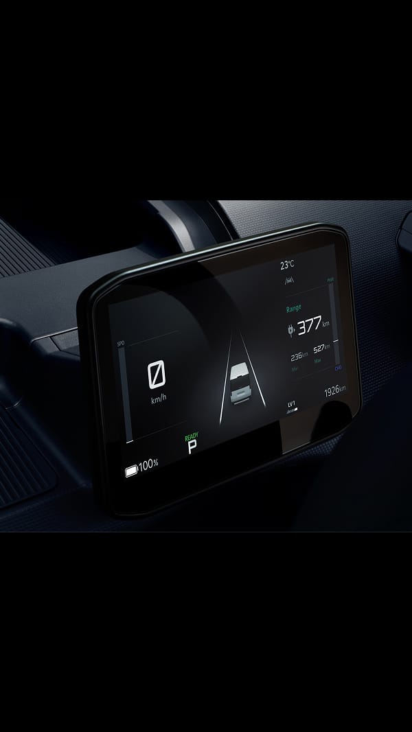Close-up of the Kia PV5 Passenger digital cluster with driving information