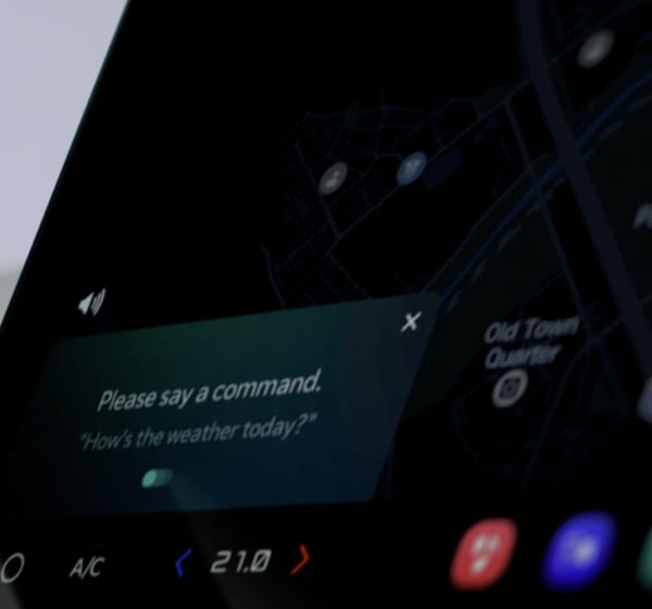 Close-up of Kia PBV IVI with a voice-command prompt and navigation map