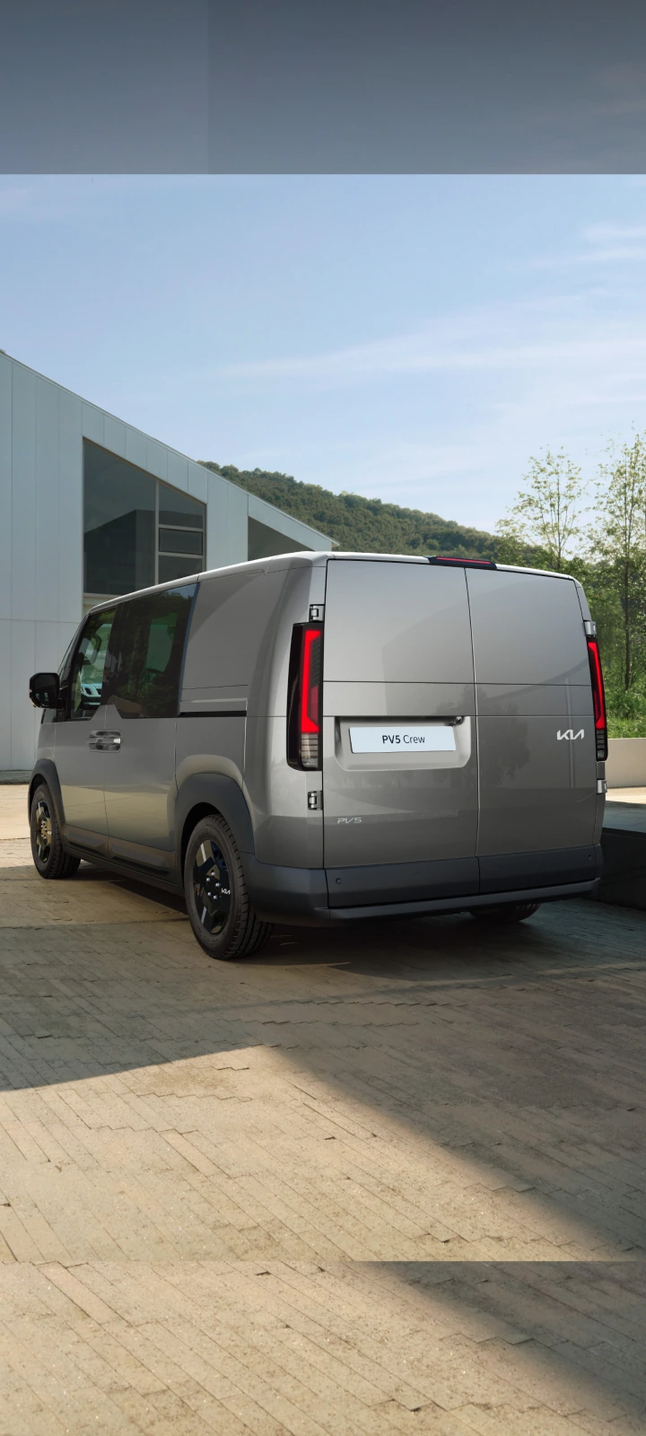Rear three-quarter view of the Kia PV5 Crew Van