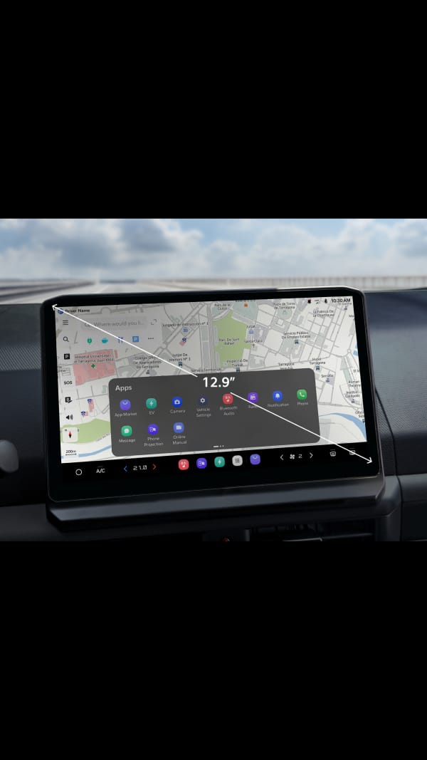 32,7 cm (12,9 Zoll) Breitbild-Display des Kia PV5 WAV mit Navigation und App-Steuerung für einfachen Zugriff während der Fahrt.