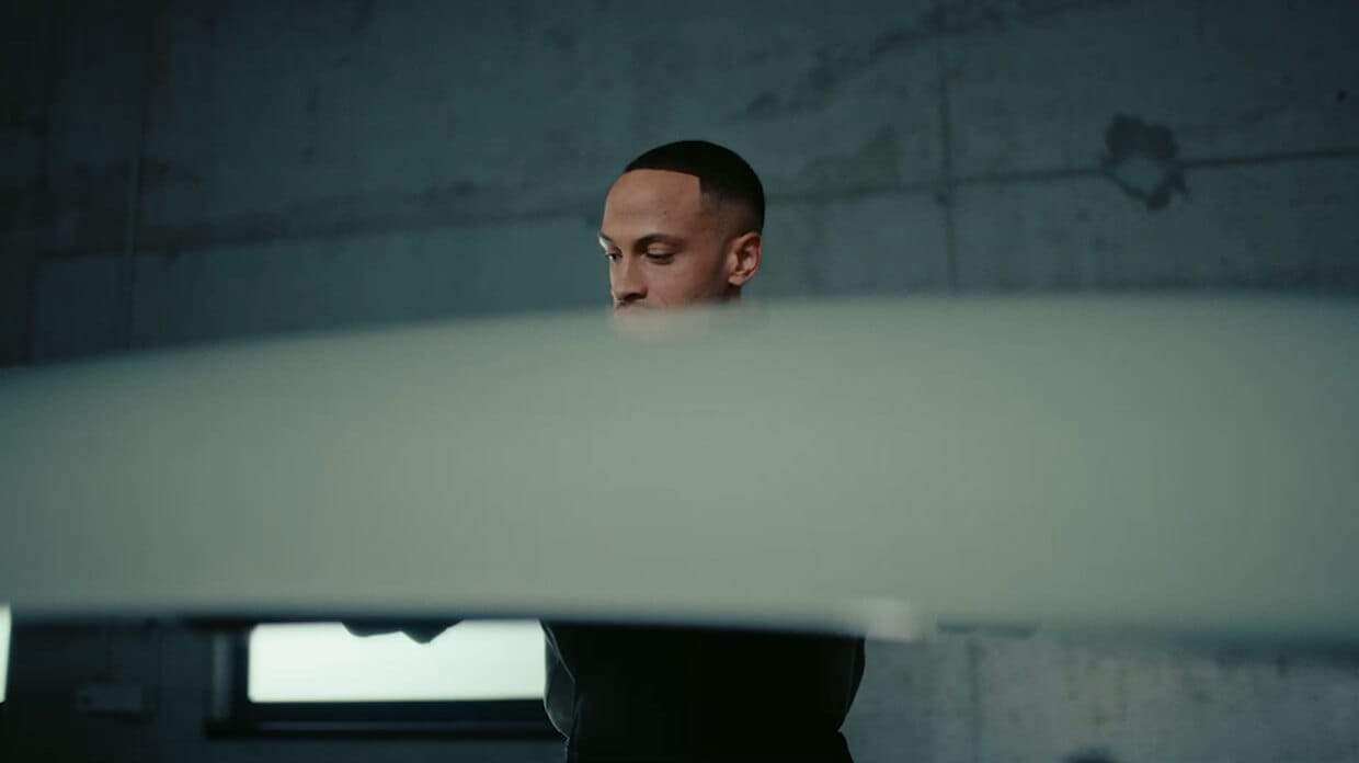 A Kia Technician carefully inspects a Kia EV3 as part of the Kia Health Check.