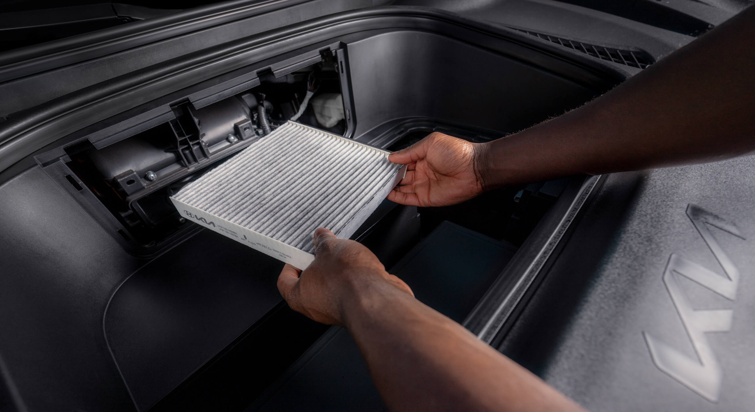 Kia Technician replaces Kia Genuine Cabin Air Filter.