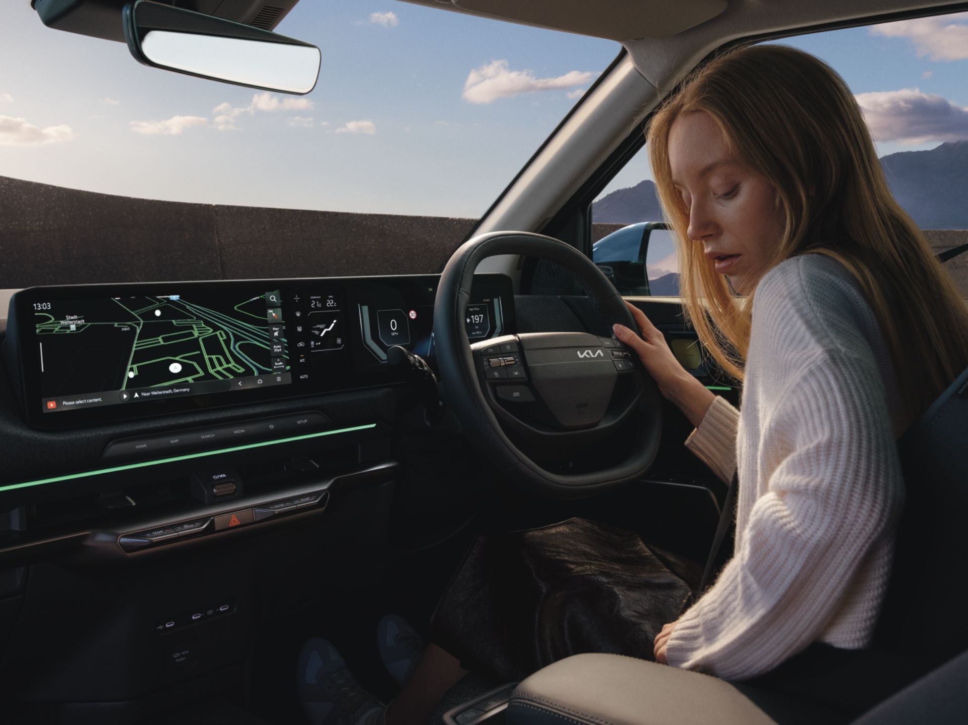 Panoramic triple-display infotainment.