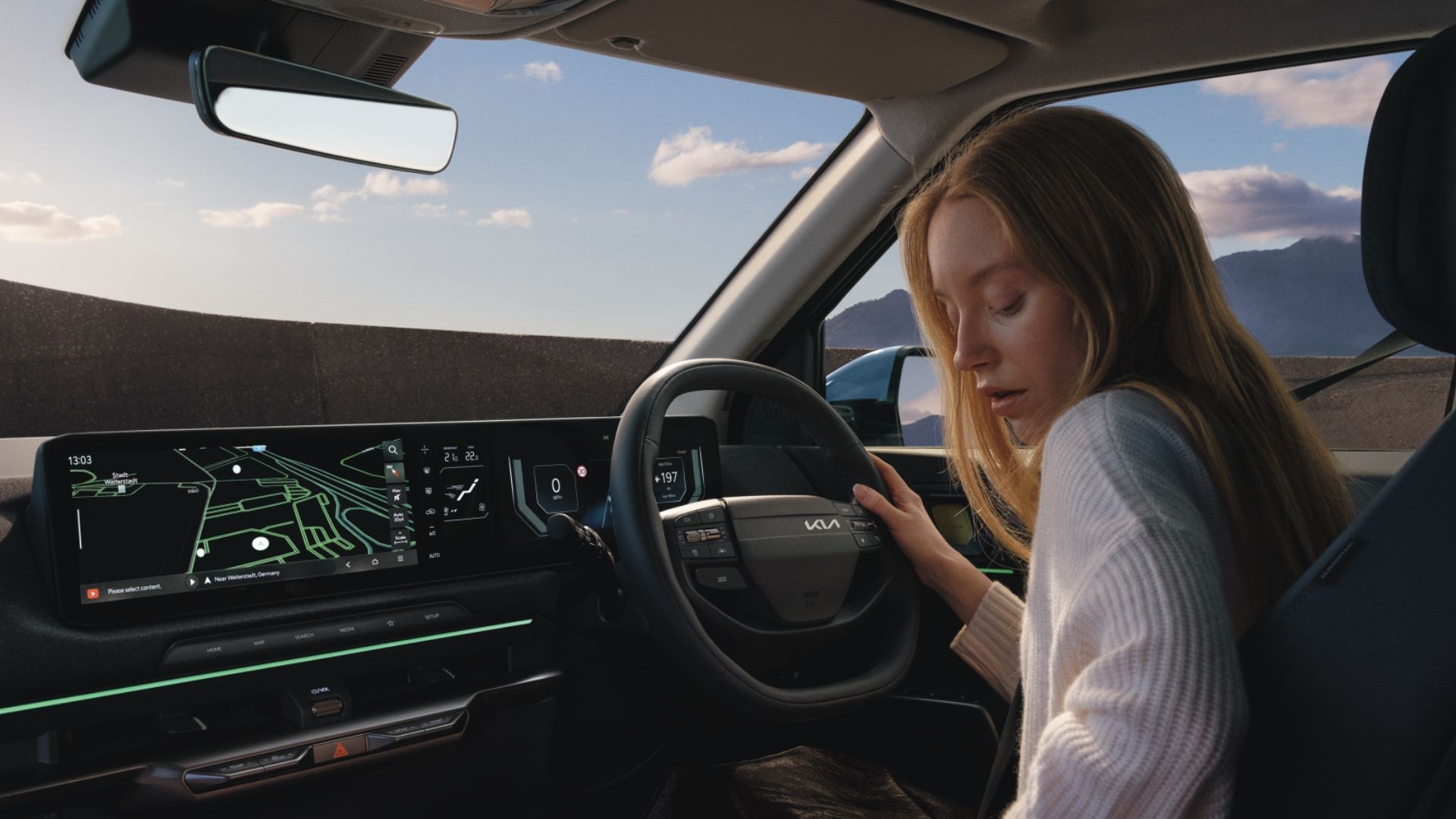 Panoramic triple-display infotainment.