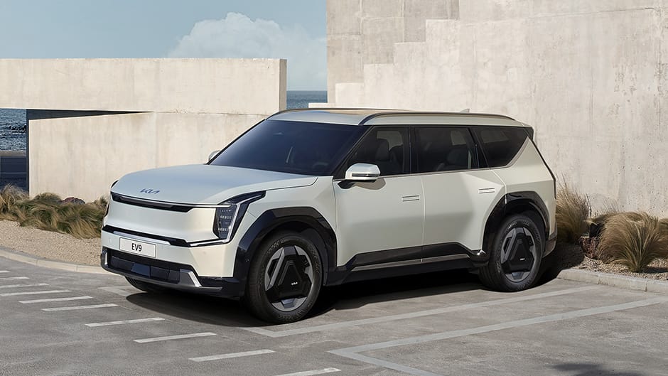 Blue Kia Soul EV front charging