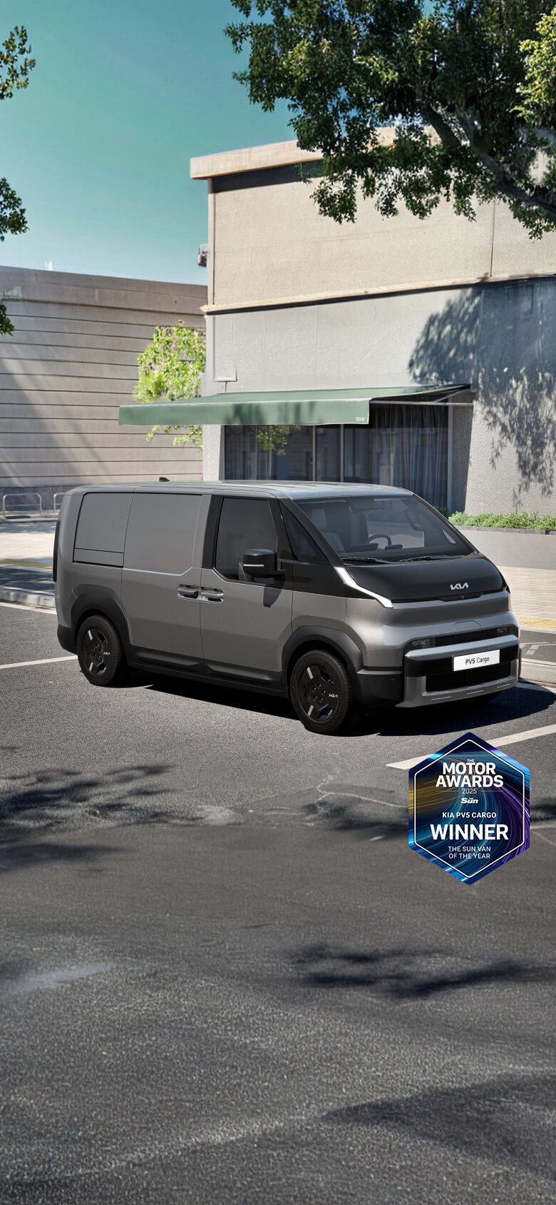 Front-side view of the Kia PV5 Cargo Long parked on an urban street