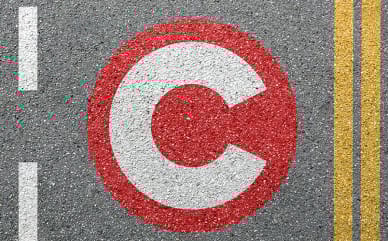 White is in red circle as sign on the road