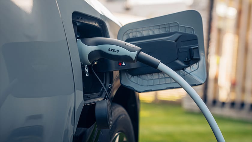 Charging cable plugged into a Kia EV3 GT-Line