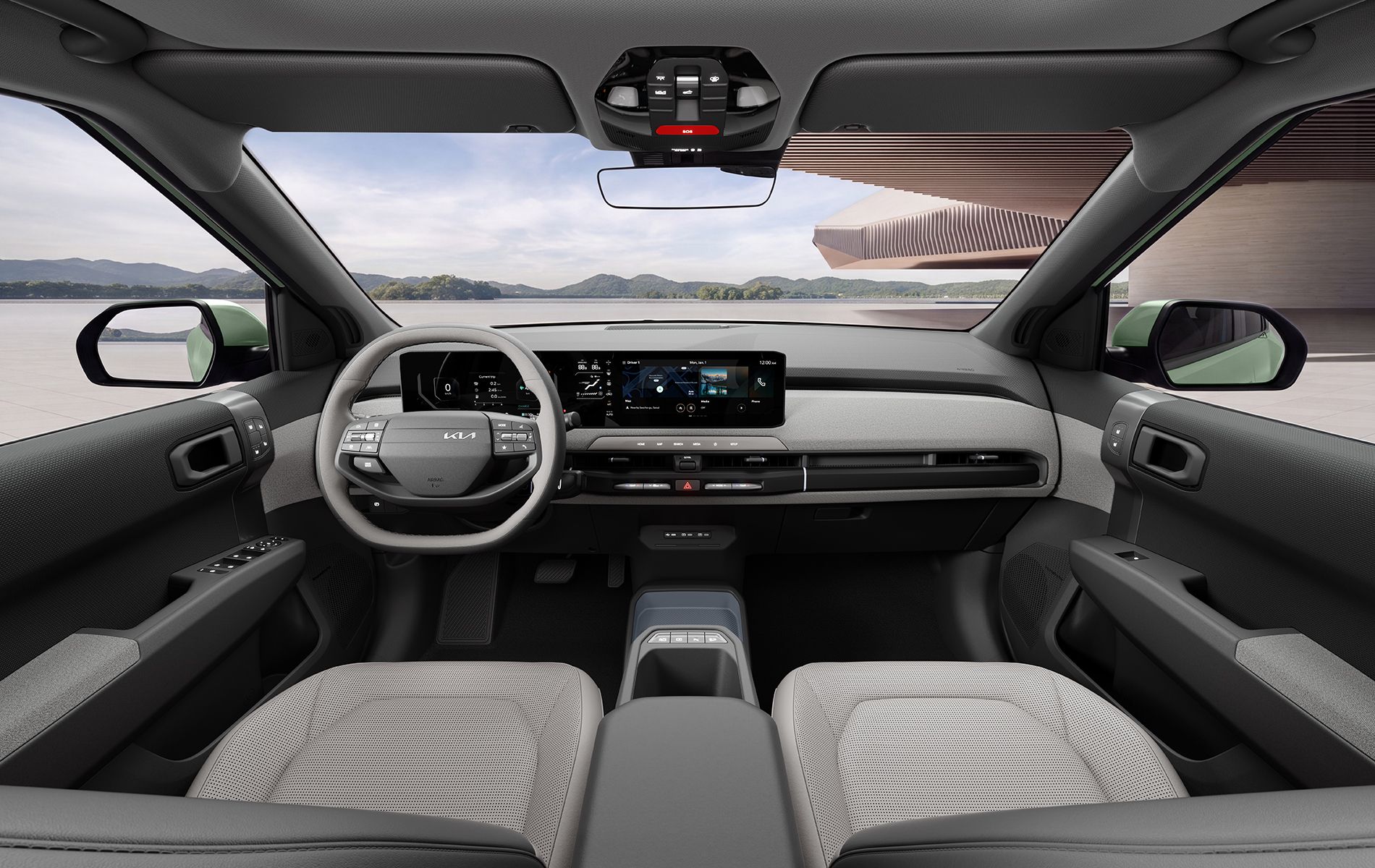 Interior del Kia EV3 con pantalla panorámica, consola minimalista y materiales de inspiración sustentable