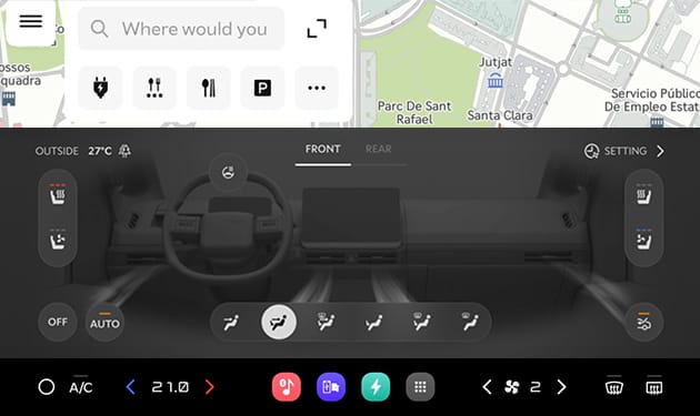 Car infotainment screen with climate control, airflow direction, and temperature settings