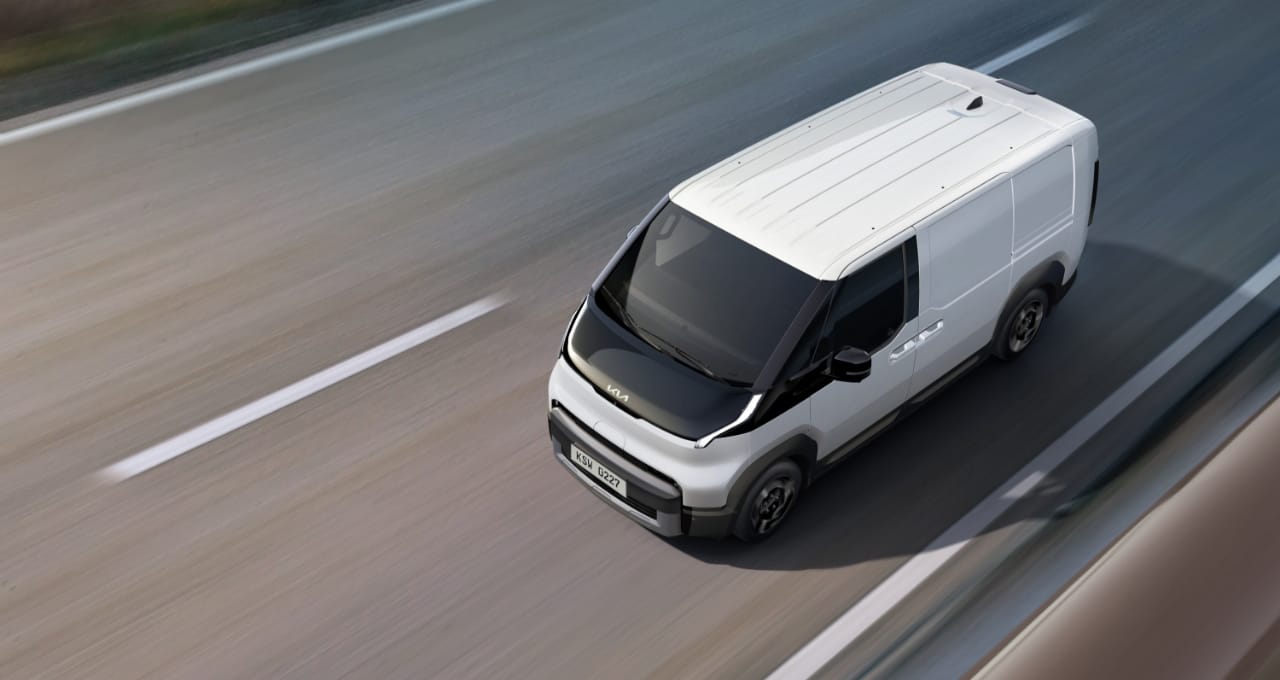 Top view of the Kia PV5 Cargo driving on highway