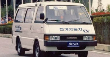 1988 Kia Besta EV Driving Three-Quarter View