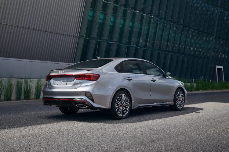 2022 Kia Forte in gray, three-quarter view from rear passenger side