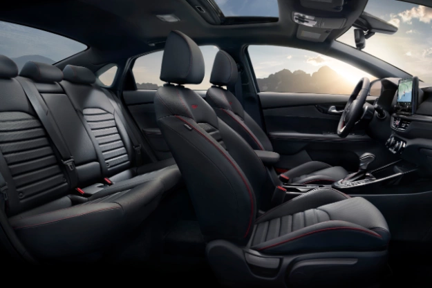 2022 Kia Forte, full view of black interior with red trim on front seats