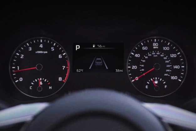 2022 Kia Forte, close-up of instrument cluster with central digital display of easy-to-read summary