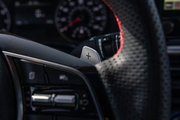 2023 Kia Forte Interior Sport Design Steering Wheel With Smart Cruise Control Close-Up