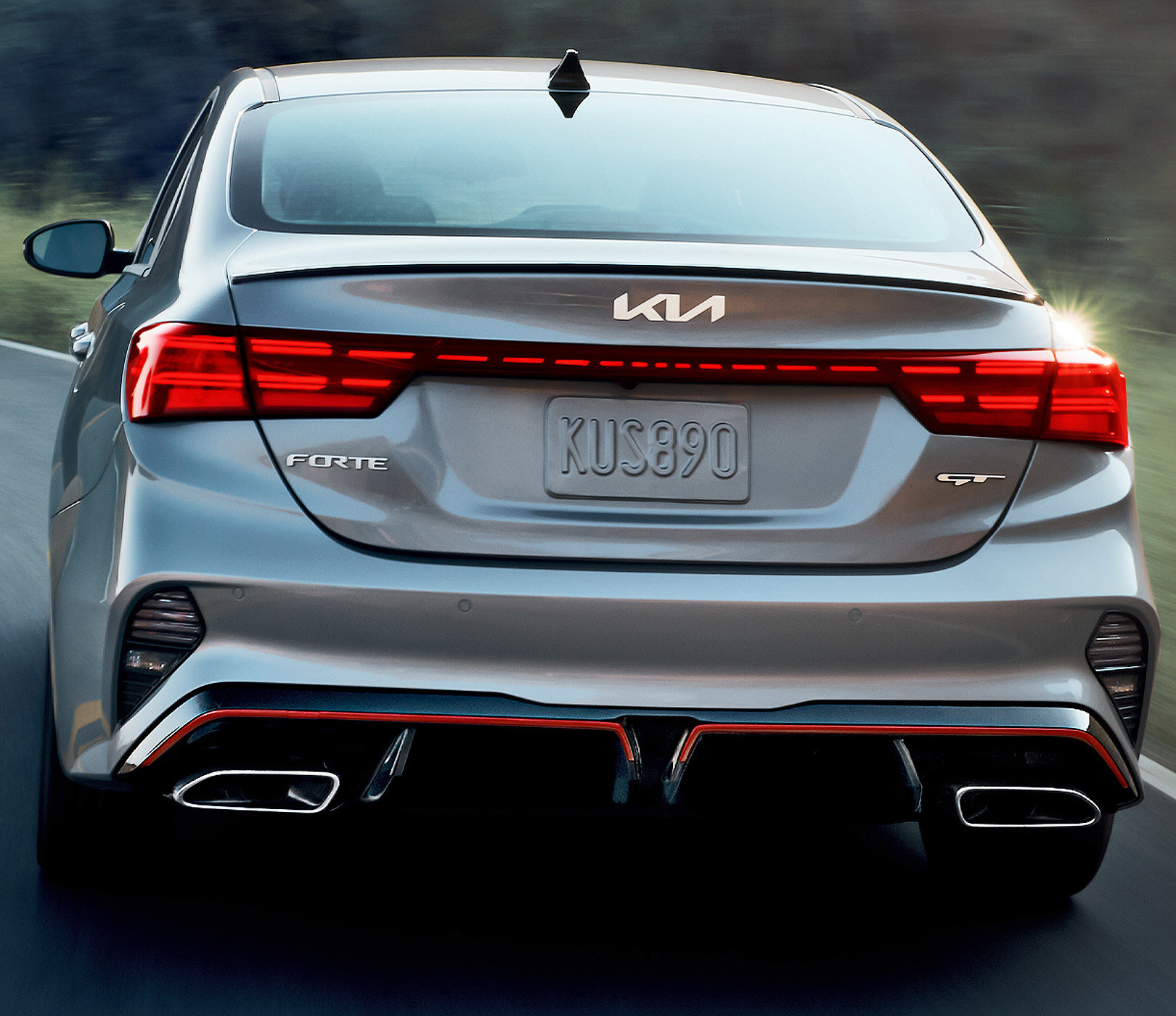 2023 Kia Forte Driving With LED Tail Lights Rear View