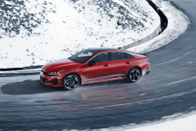 2022 Kia K5 GT-Line Driving In Snowy Conditions Side View