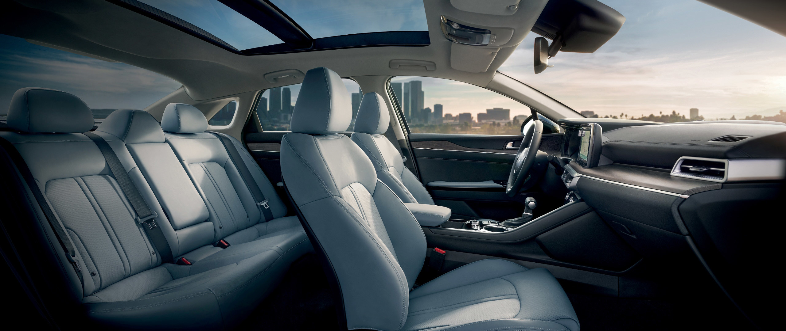 2023 Kia K5 Interior Spacious Seating And Panoramic Sunroof Side View