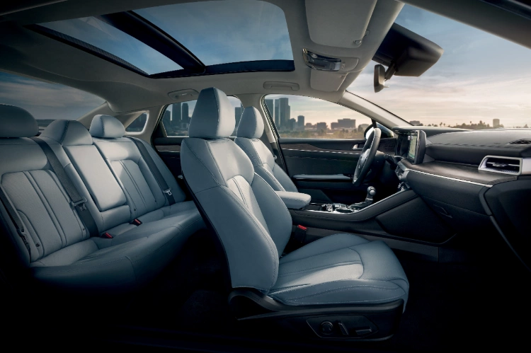 2024 Kia K5 Interior Spacious Seating And Panoramic Sunroof Side View
